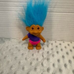 Vibrant Troll Doll with Blue Hair and Pink Outfit